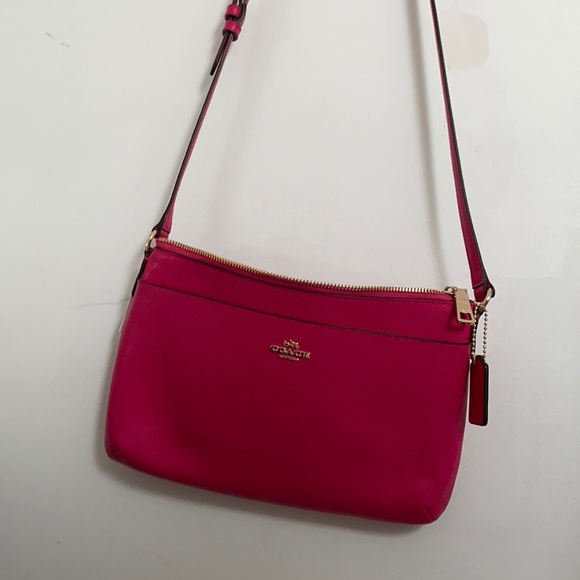 Coach Handbags - Coach cross body purse, hot pink, brand new